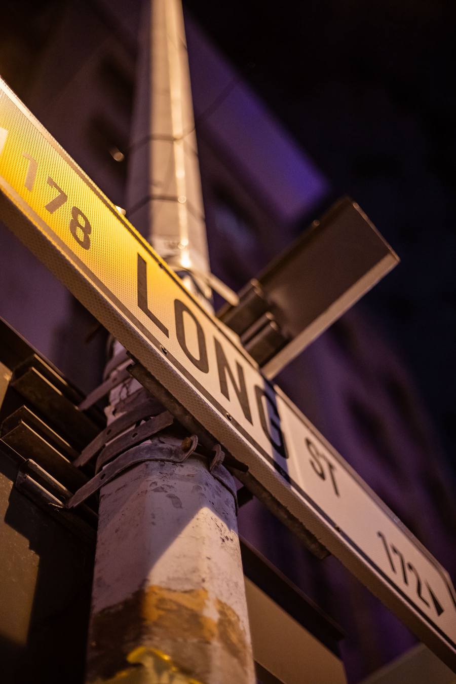 Street sign for 178 Long Street at night