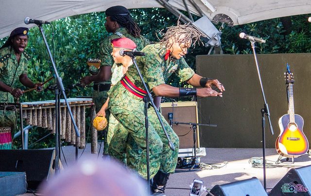 Jah Prayzah takes of his red beret as he dances for the crowd.